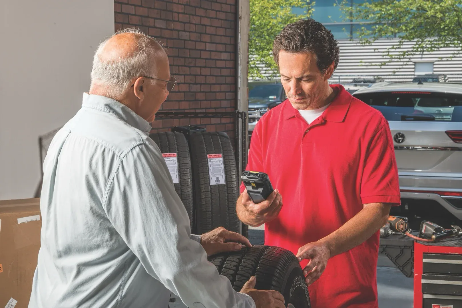 retail photography application tc58e rugged boot zebra tread intel scanning tire conversing with customer 064d8e1c65.webp